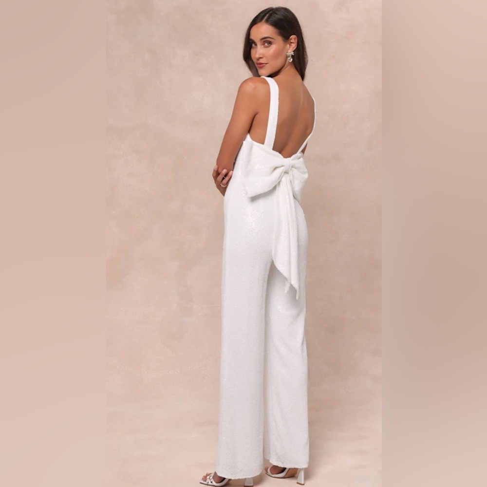 Lulu's White Sequin Jumpsuit with Giant Bow